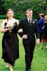 [Natalie and Steve walk down the aisle]
